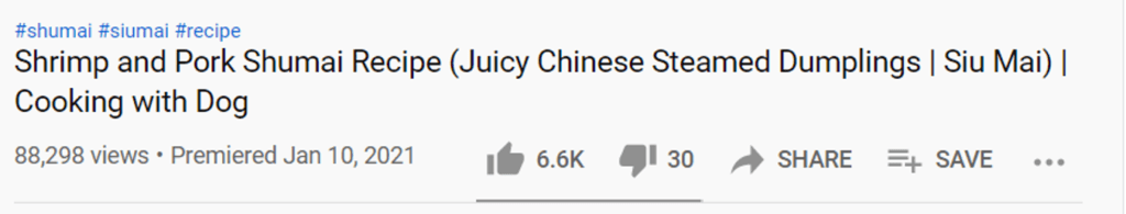Hashtags displaying in YouTube description for Cooking with Dog.